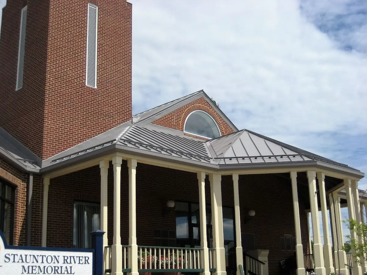 Skilled roofing craftsmen working on a residential roof in Ridgedale